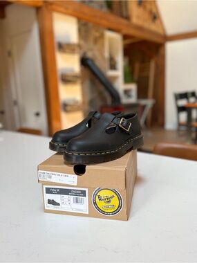 Dr. Martens Kids Black T‑Bar Polley Shoes with Yellow Stitching